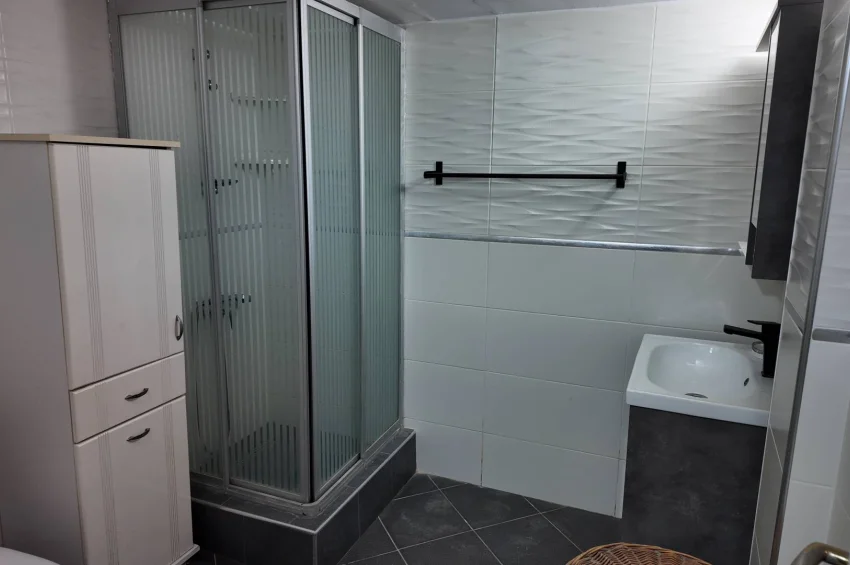Wyremontowana willa typu triplex z zachwycającym widokiem na morze i udogodnieniami premium w Bahçeli