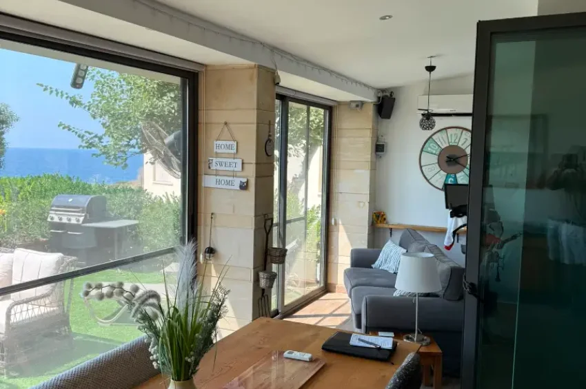 Fully Renovated 2-Bedroom Garden Apartment with Frontline Sea Views in Esentepe
